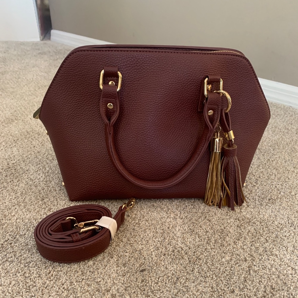 Charming Charlie’s burgundy purse with tassels